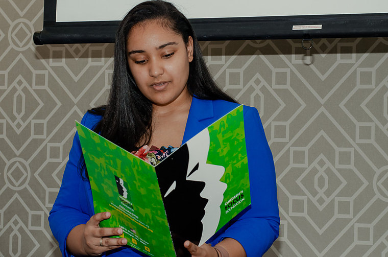 A participant reading CFF program materials