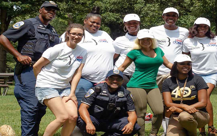 CFF participants and officers at an outdoor community event